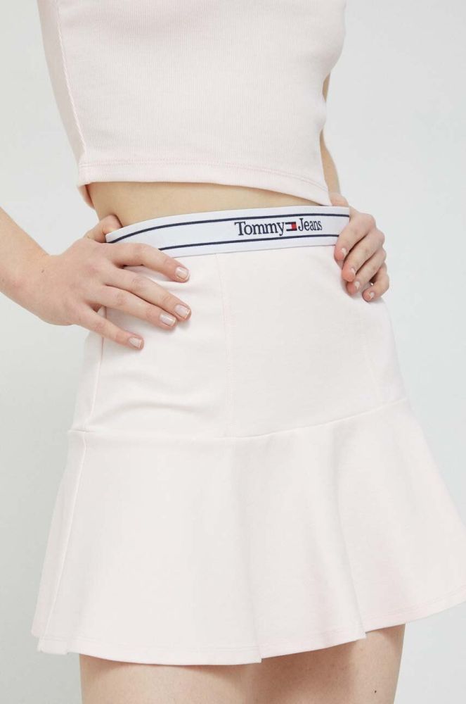 Спідниця Tommy Jeans колір рожевий mini розкльошена